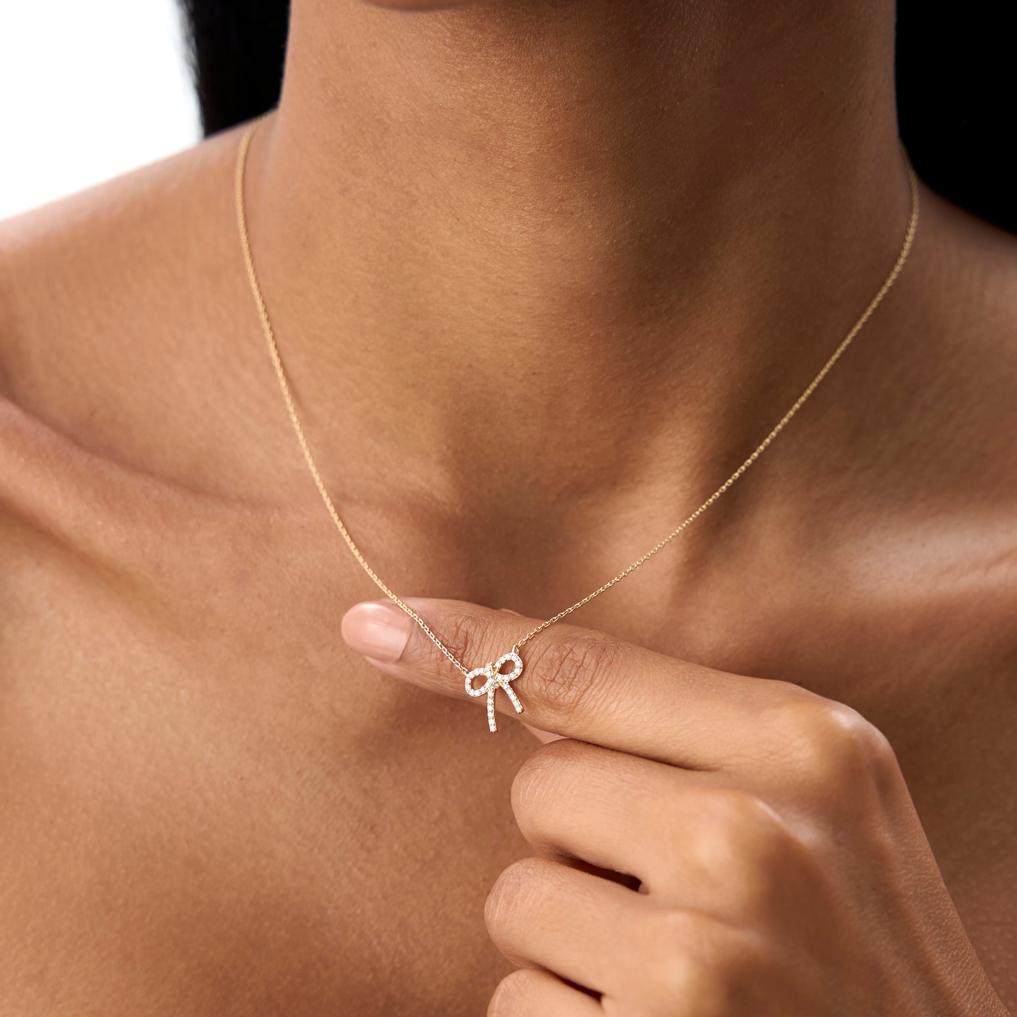 OBFJ0906 - 14k Diamond Bow Necklace 4