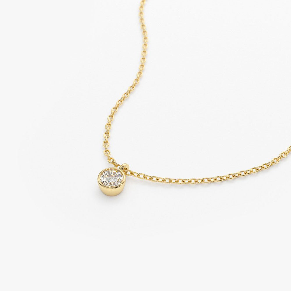 OBFJ1638 - 14K Gold Diamond Solitaire on a Bail 9