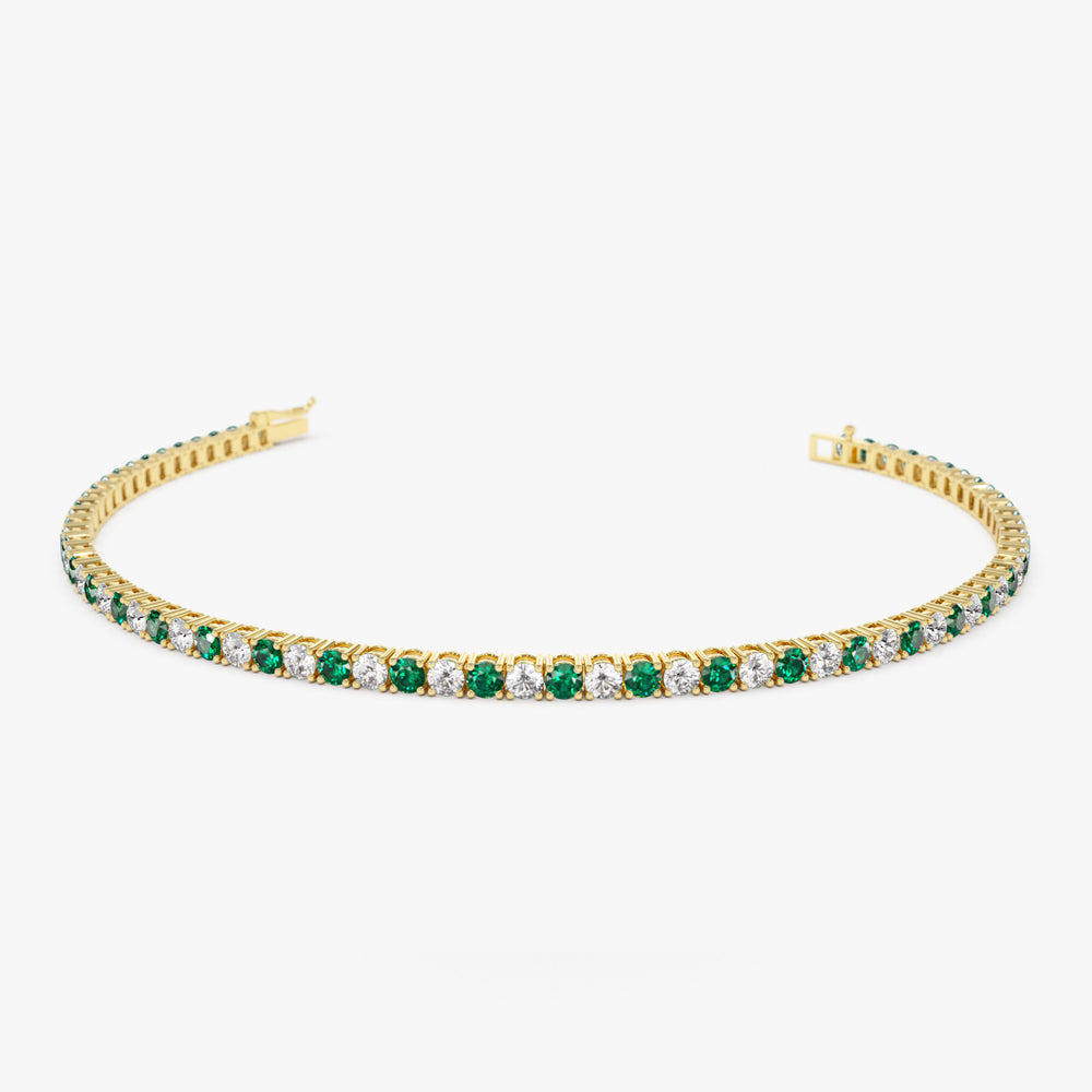 OBFJ2283 - Prong Setting Diamond and Emerald Tennis Bracelet bracelets in selectable metal and diamond options - Roselle Jewelry view 1