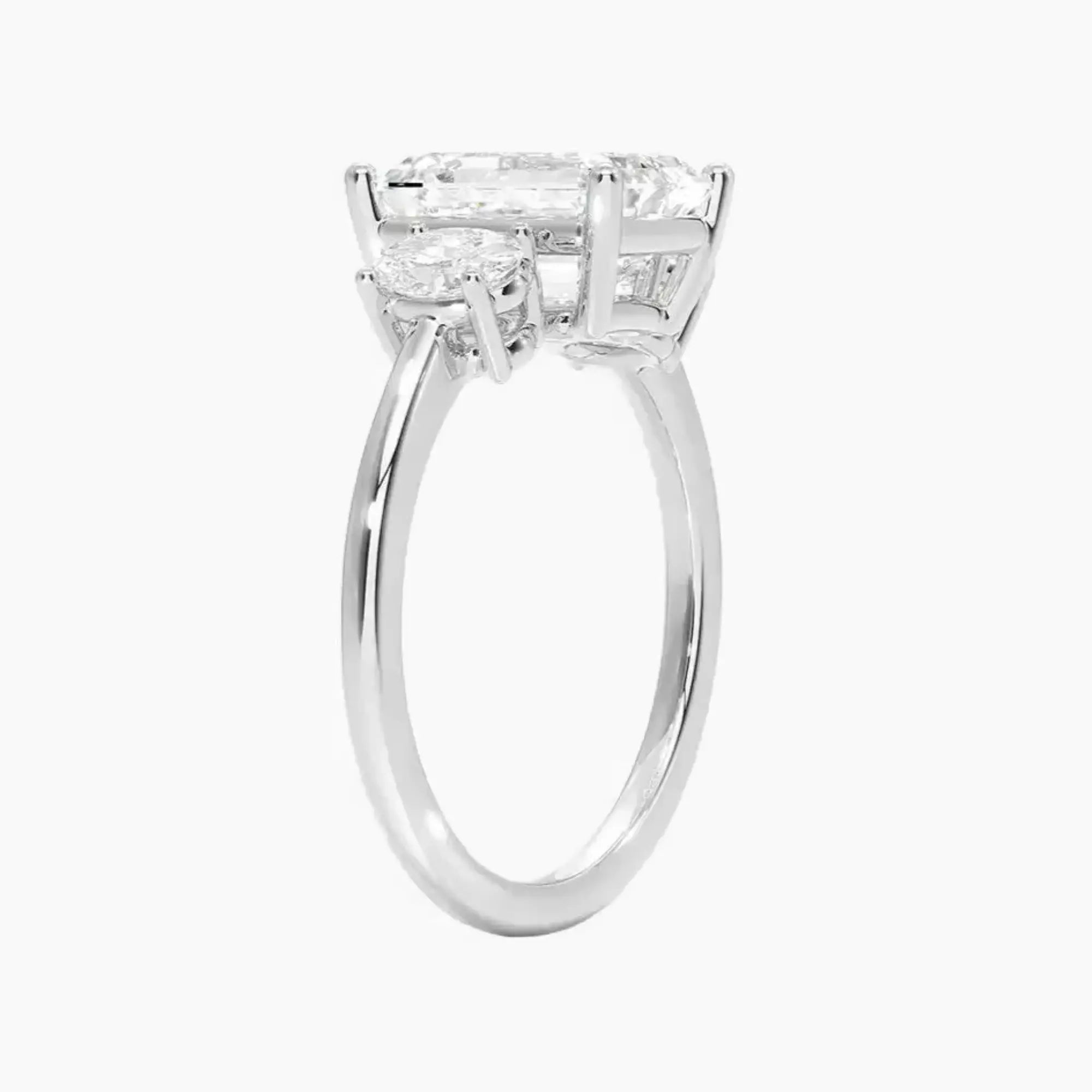 OBSER569 - Liora Three Stone Emerald engagement ring setting view 2