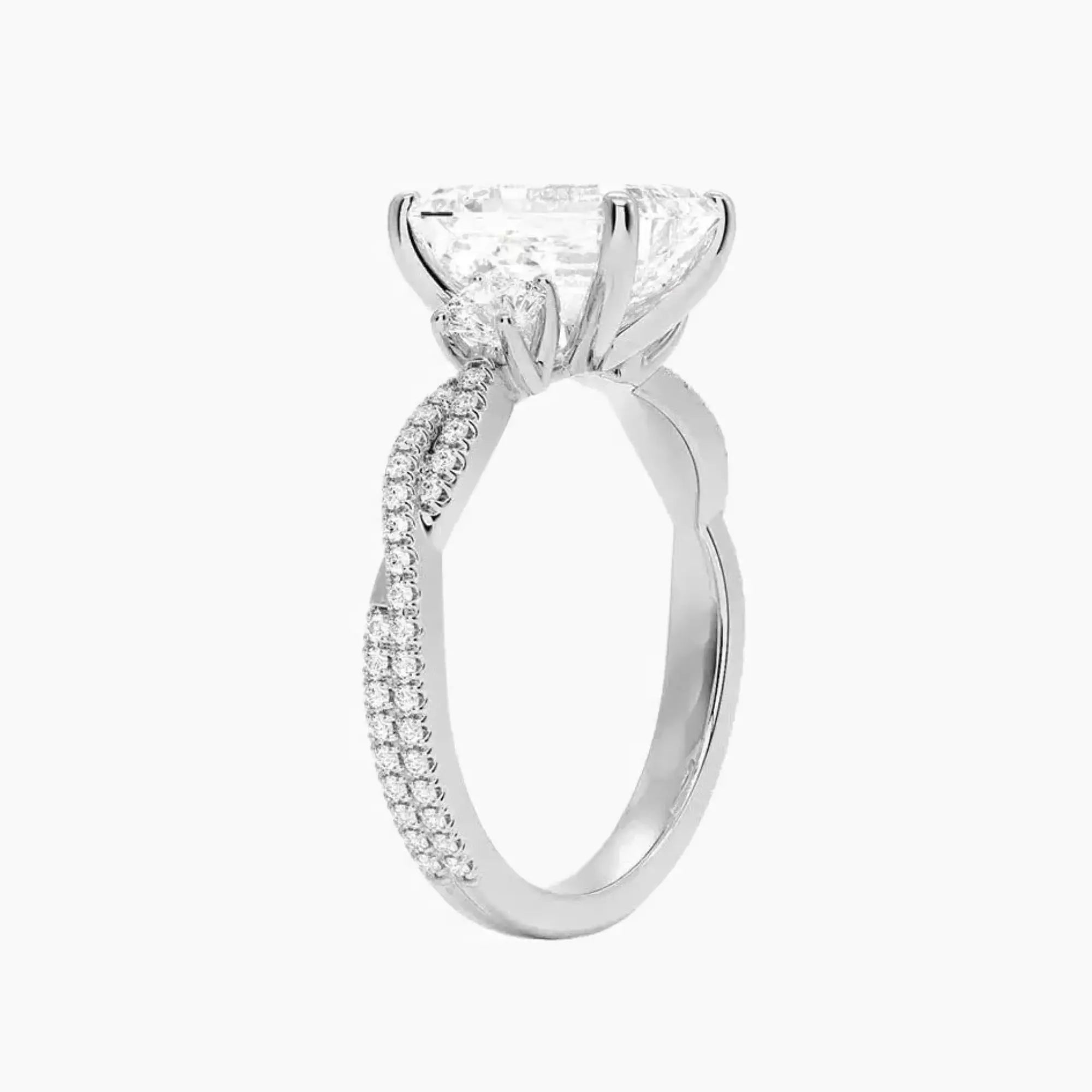 OBSER609 - Calista Adorned Three Stone Emerald Twisted engagement ring setting view 2