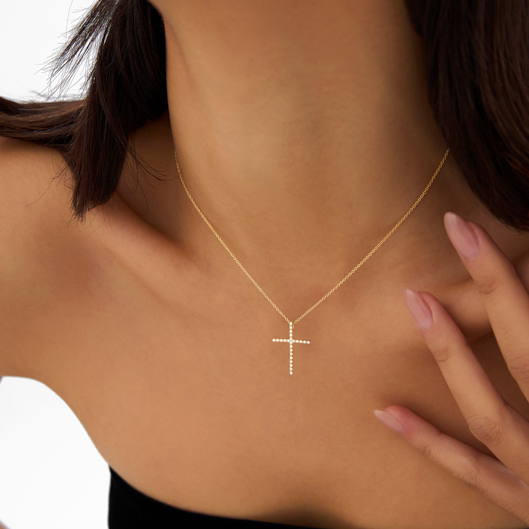 OBFJ1010 - 14k Single Shared Prong Diamond Cross 2