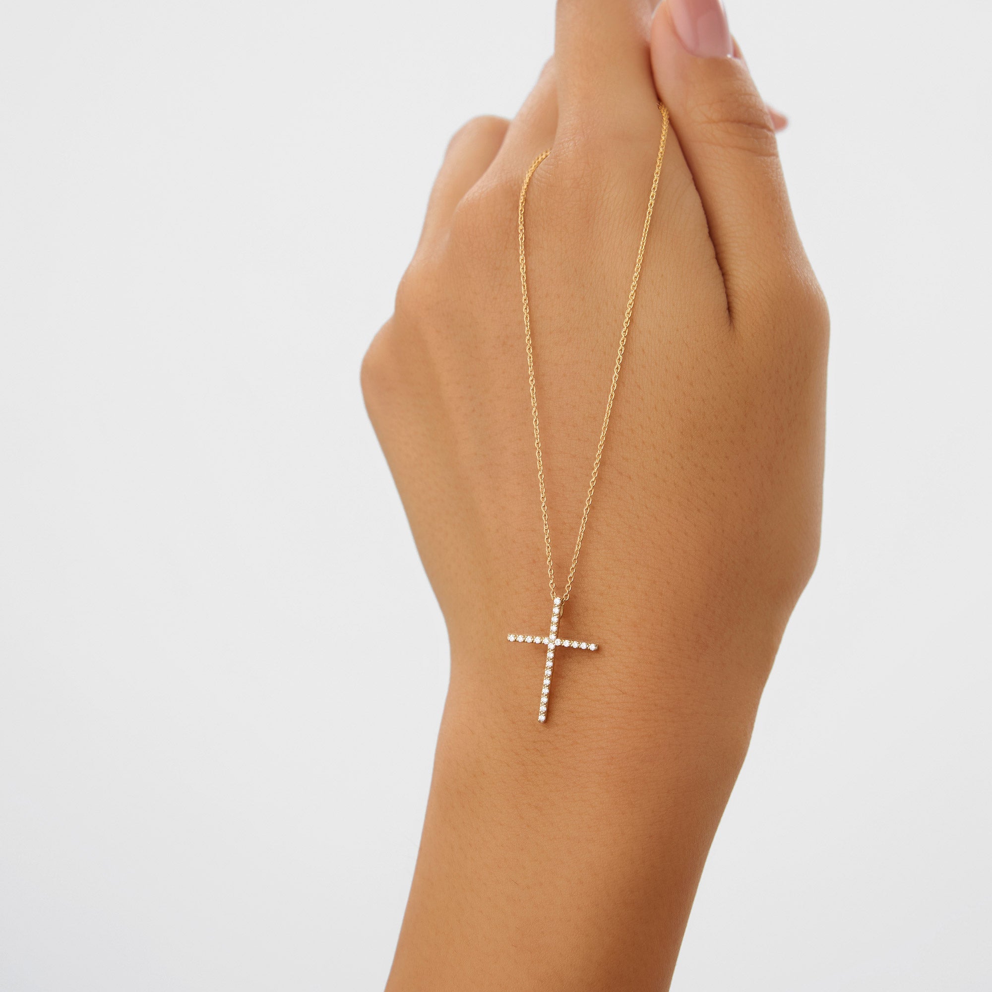 OBFJ1010 - 14k Single Shared Prong Diamond Cross 4