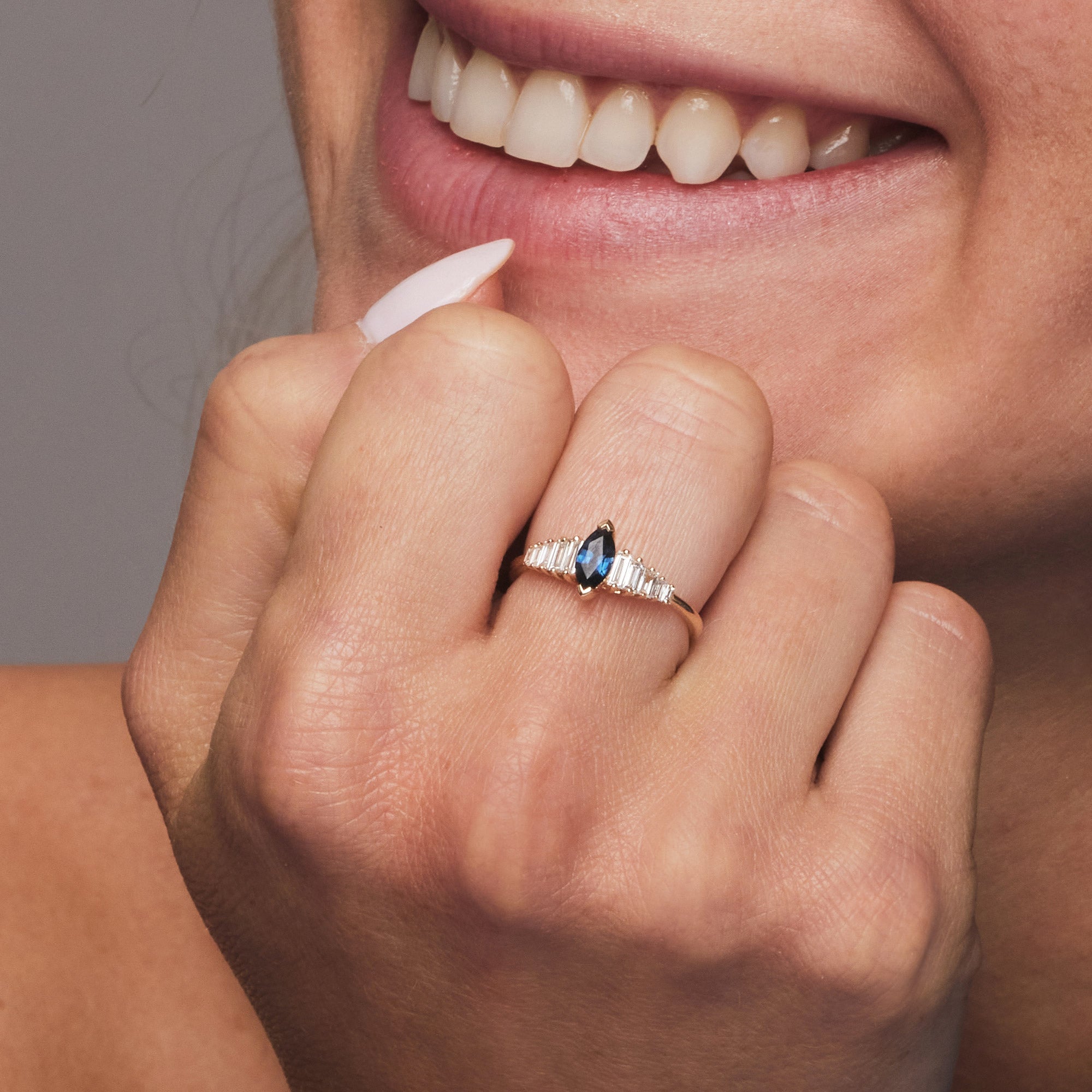 OBFJ1212 - 14k Gold Marquise Shape Sapphire  Ring with Baguette Accents 2