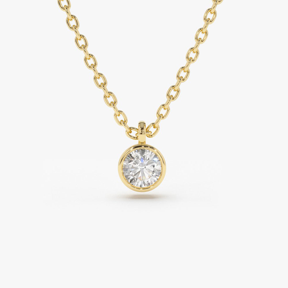OBFJ1638 - 14K Gold Diamond Solitaire on a Bail 1